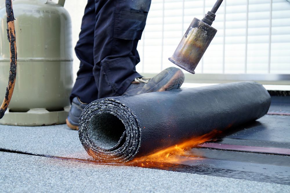 Professional Worker Doing Roof Waterproofing