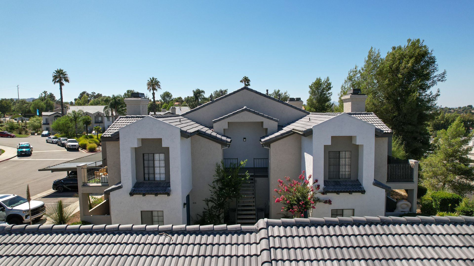 An aerial view of a house with a tiled roof