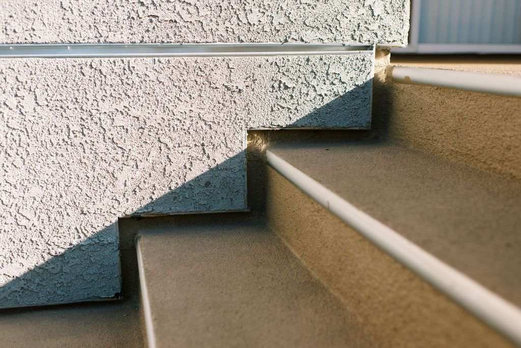 A close up of a set of stairs leading up to a building
