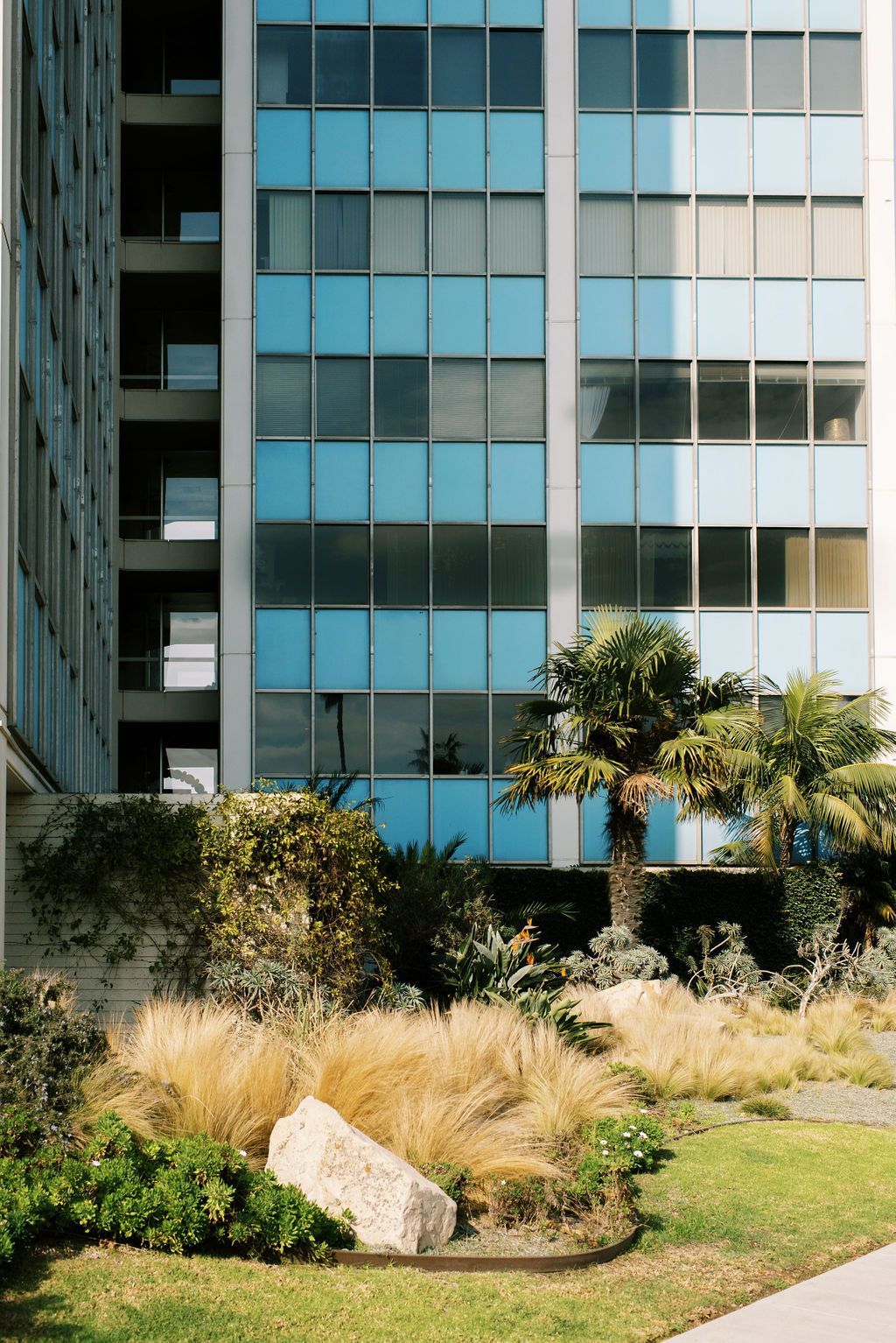 A large blue building with a lot of windows