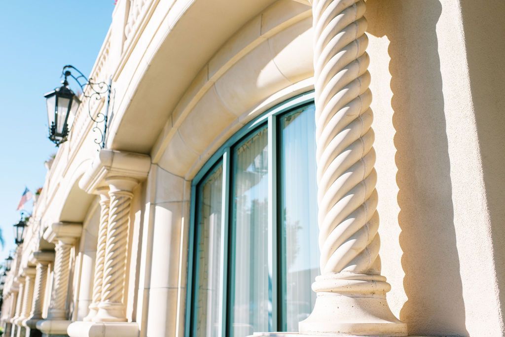 A building with a lot of columns and a window