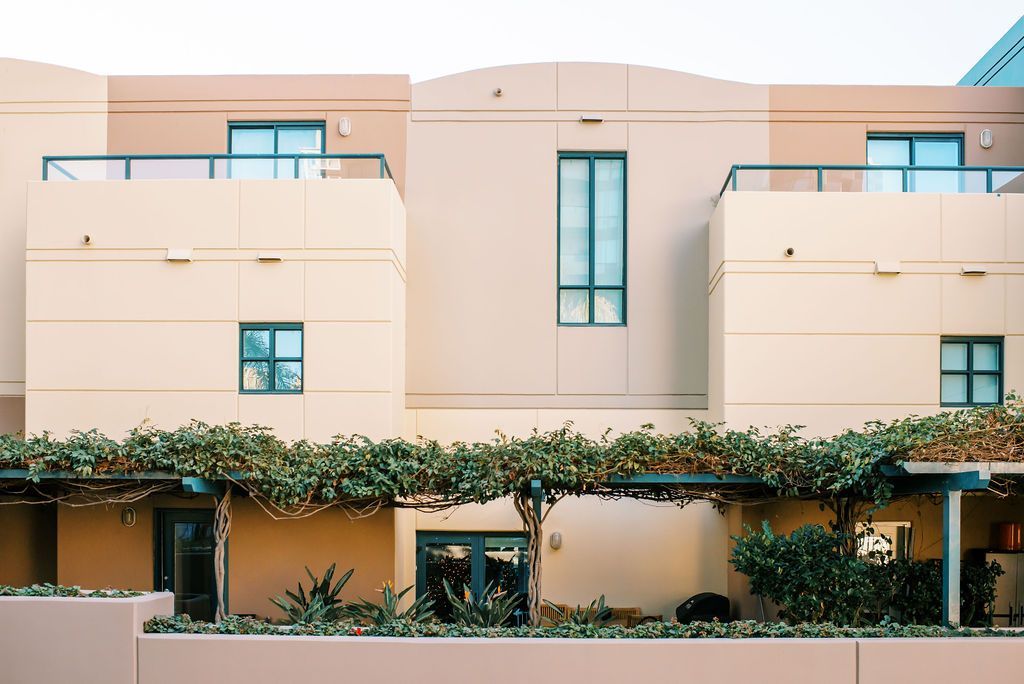 A building with a lot of windows and balconies