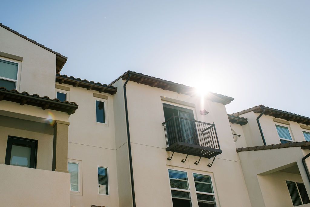 The sun is shining through the windows of a building