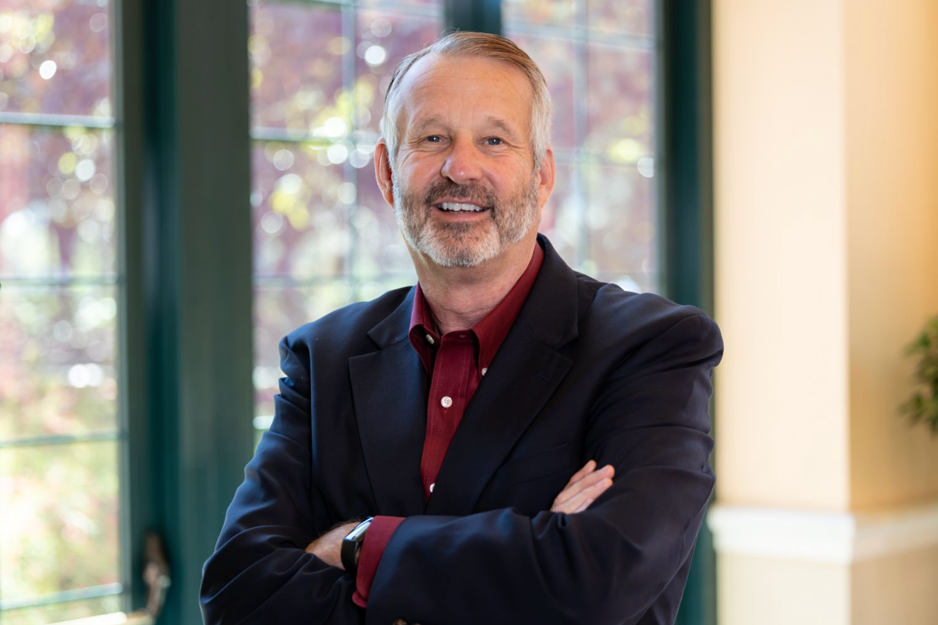 Professional executive headshot captured on location for corporate branding.
