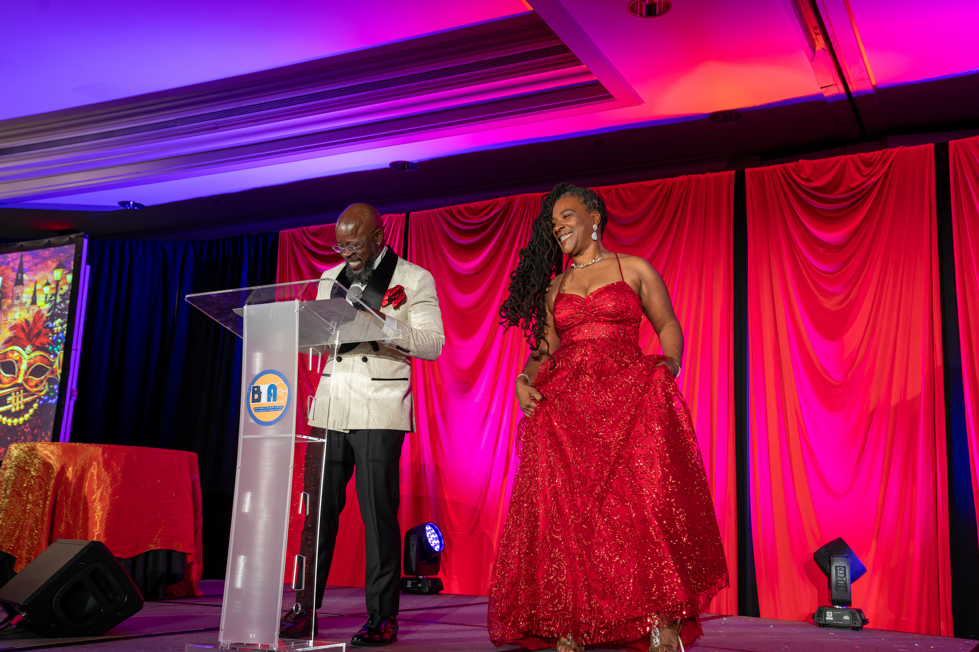 Professional event photography capturing an awards presentation during a corporate gala.