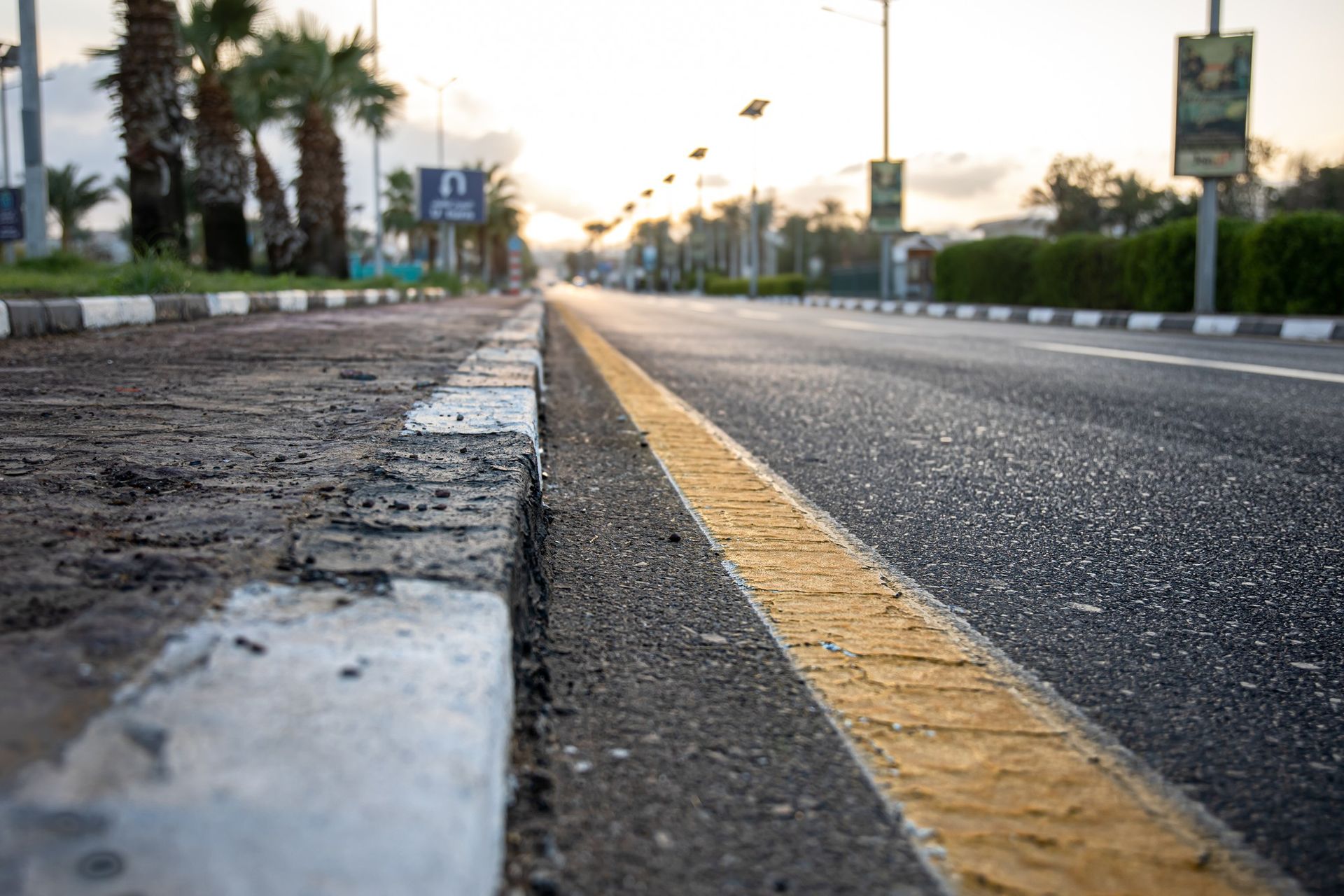 There is a yellow line on the side of the road.