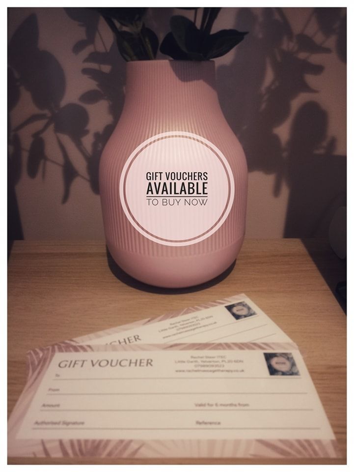 A pink vase with a sticker that says gift vouchers available