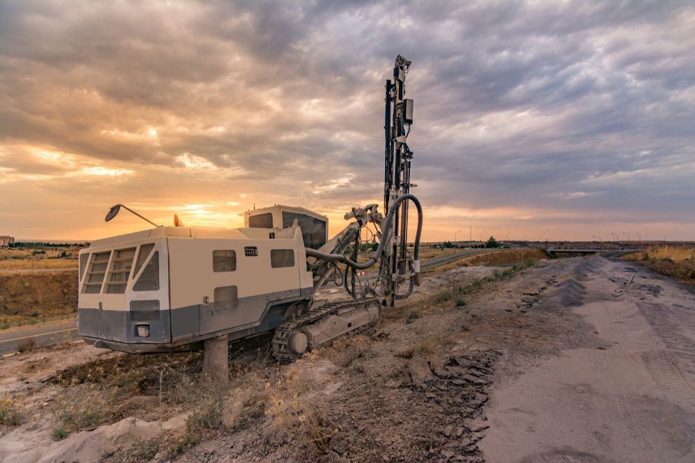 Drilling Machine on a Dirt Road — Hot Shots 2 U In Townsville, QLD