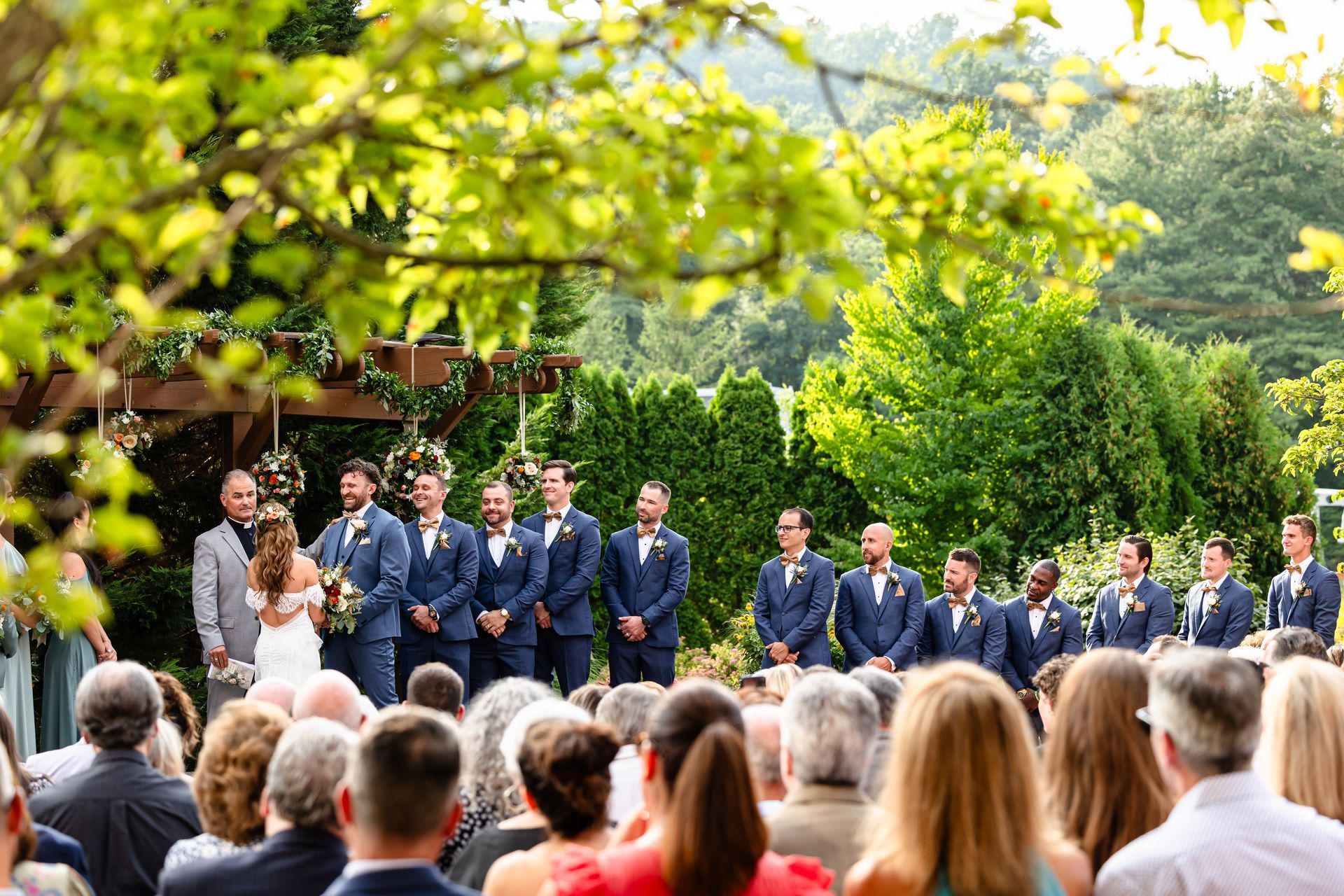 Videography by Ever After Studio of full bridal party and guests during ceremony