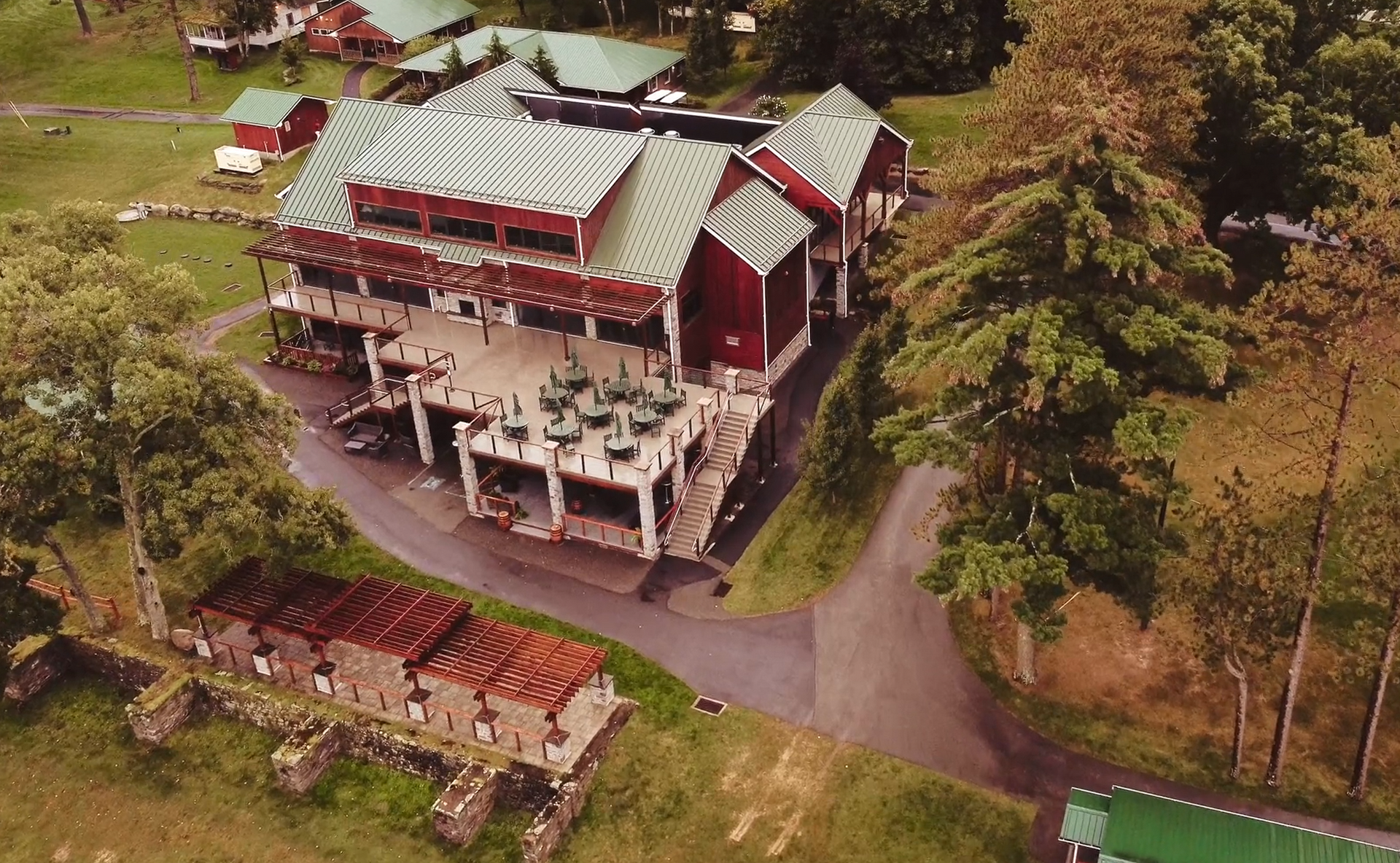 Arial view of venue in the woods in the Poconos by Ever After Studio
