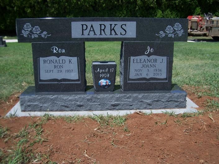 Parks family memorial headstones and plaque on a stone base in a cemetery