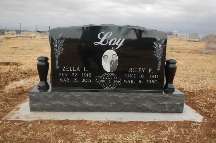 Black granite double gravestone engraved 