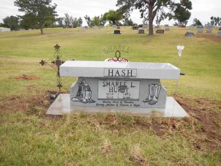 Gravestone in a grassy cemetery with the name “Hash” engraved on it.