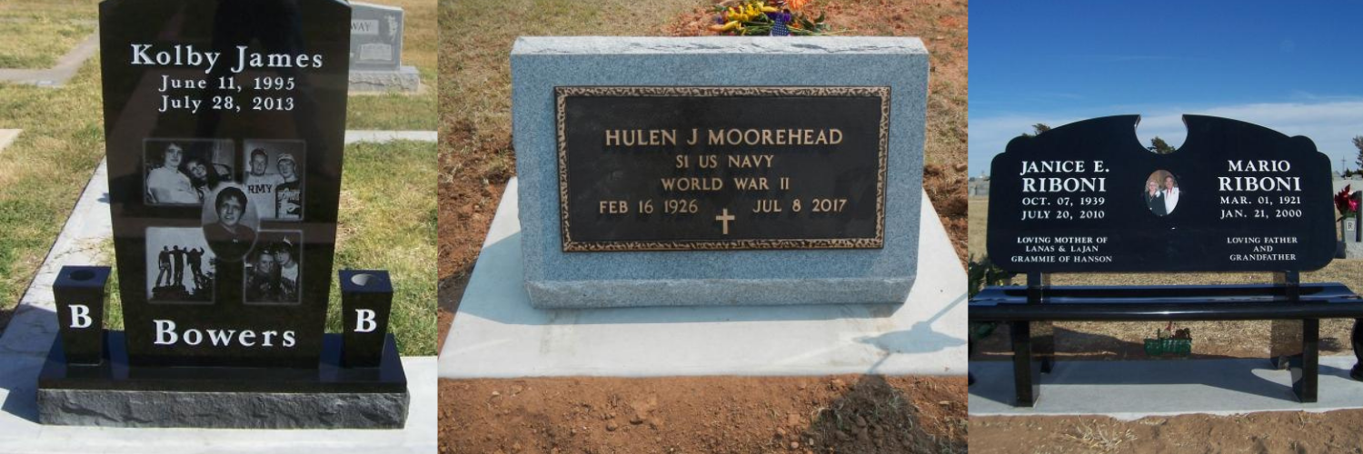 Three black memorial headstones with gold lettering on a brick base outdoors.