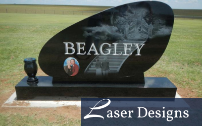 Black granite memorial headstone with “BEAGLEY” and a photo medallion in a grassy cemetery.