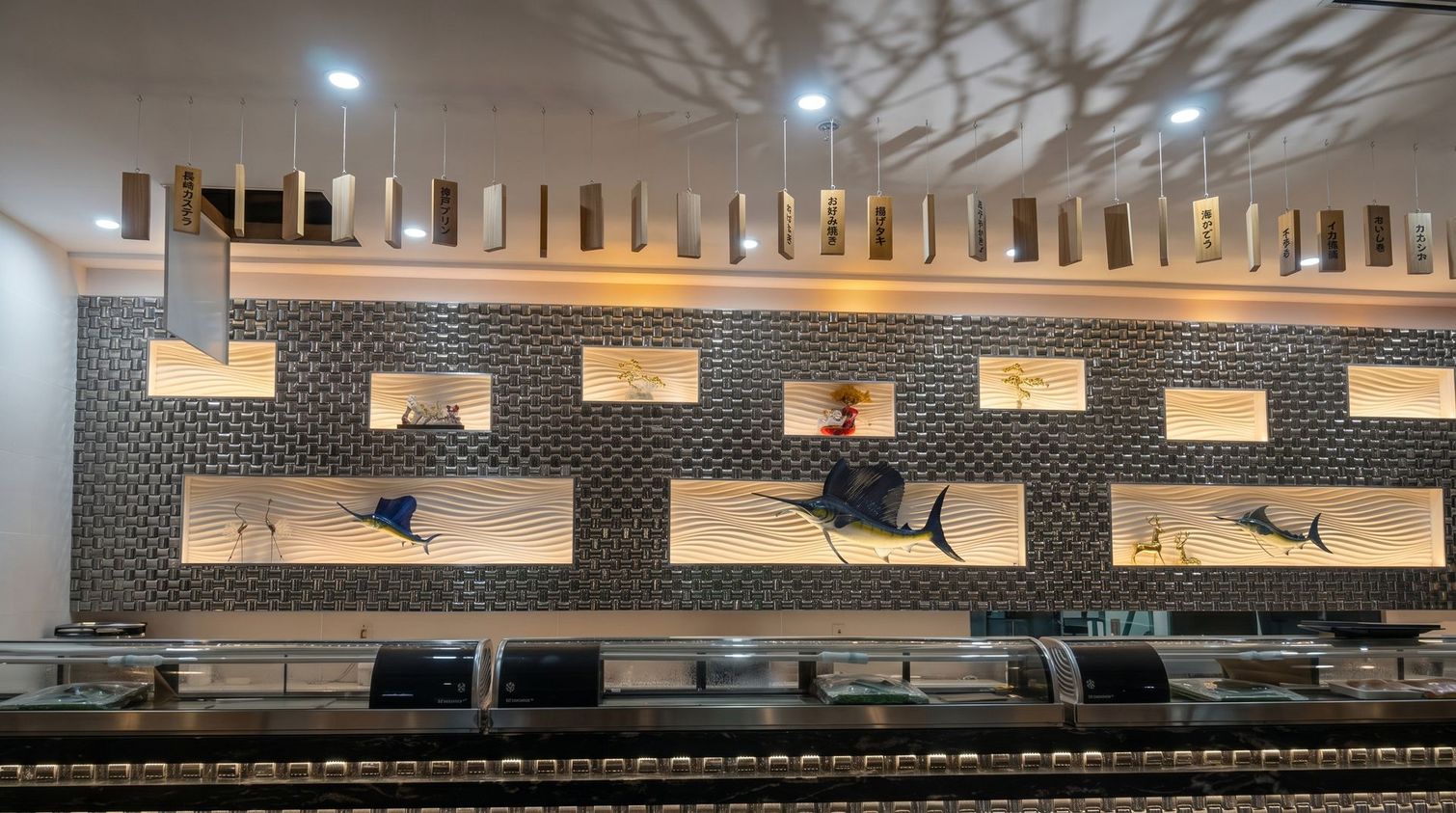 Wide indoor horse mural with lit wall panels and seating in front