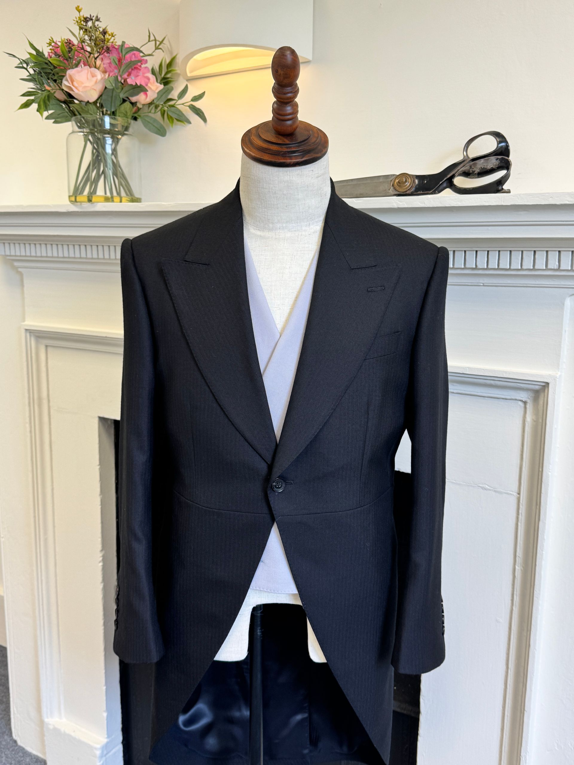 A set of bespoke Morning Tails on display at Edward George Tailoring 