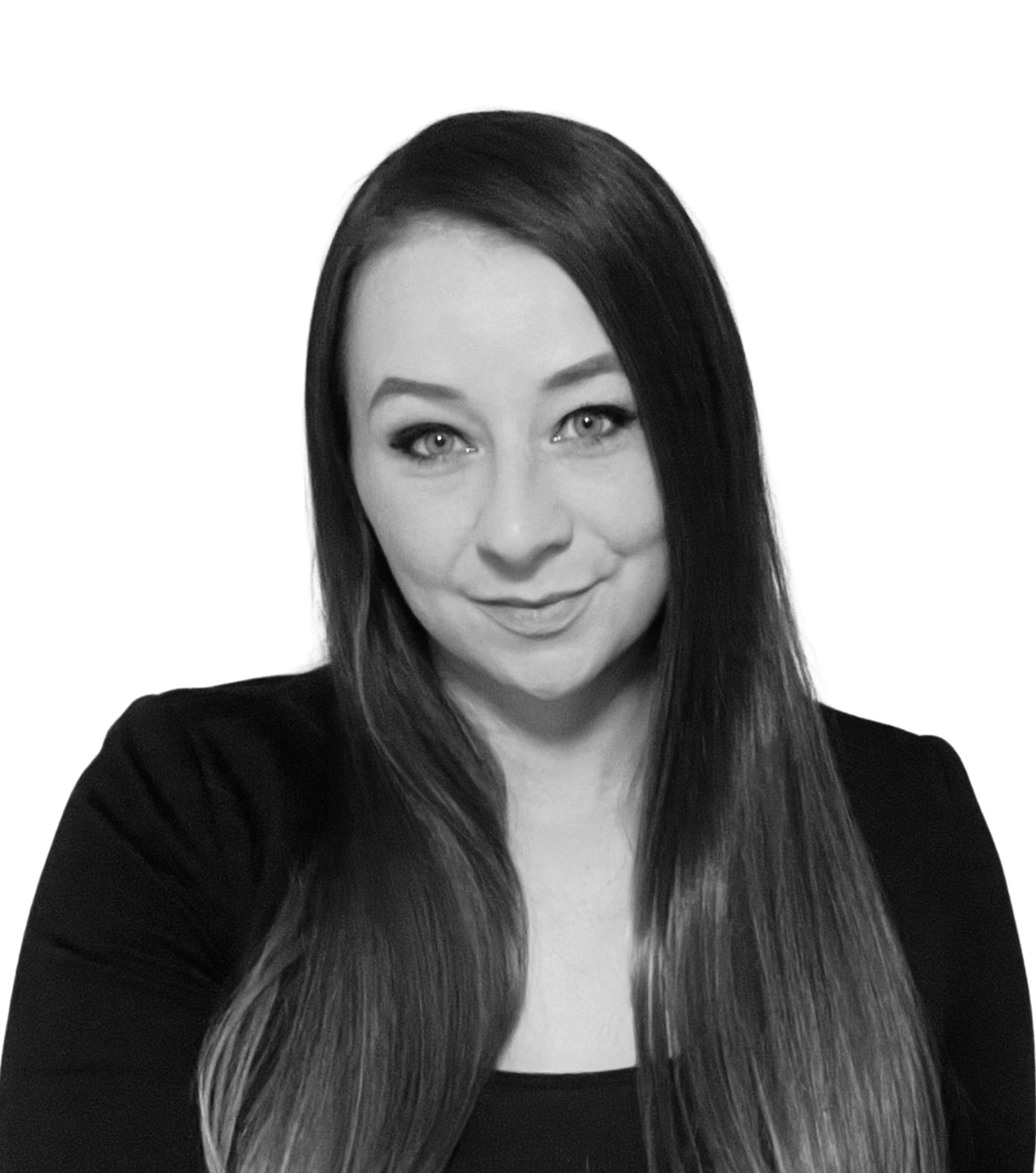 A woman with long hair is smiling in a black and white photo.