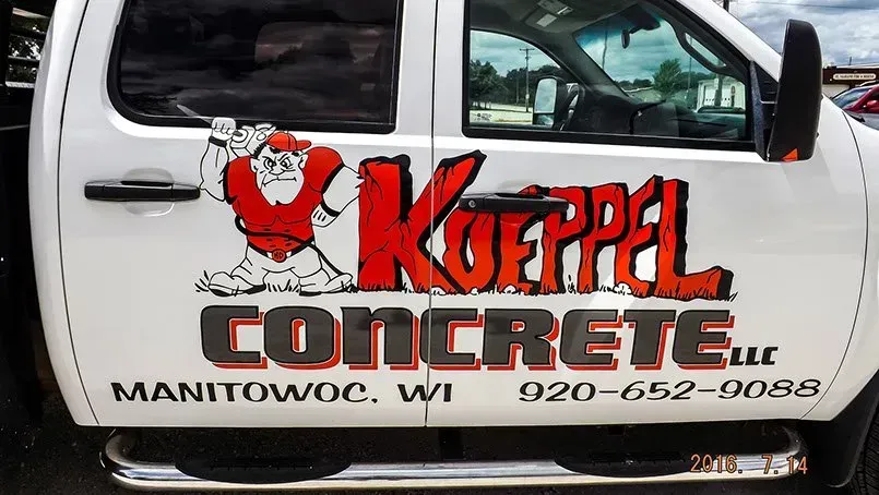 A white truck that says koppel concrete on the side