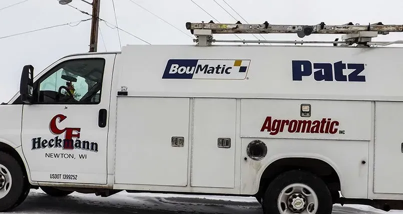 A white truck with the word patz on it