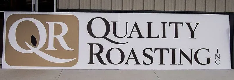 A sign that says quality roasting on it