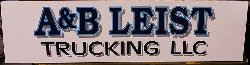 A sign that says a & b leist trucking llc on it