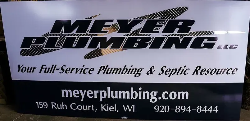 A sign that says meyer plumbing on it