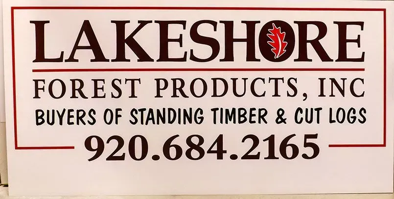 A sign for lakeshore forest products inc buyers of standing timber and cut logs