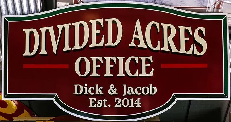 A sign that says divided acres office on it