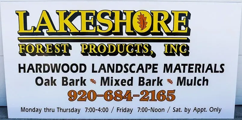 A sign that says lakeshore forest products ing hardwood landscape materials oak bark mixed bark mulch