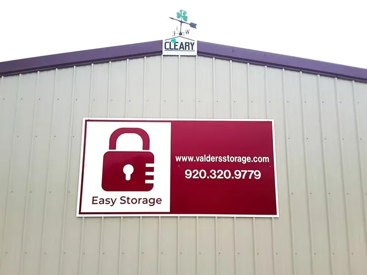 A sign on the side of a building that says easy storage