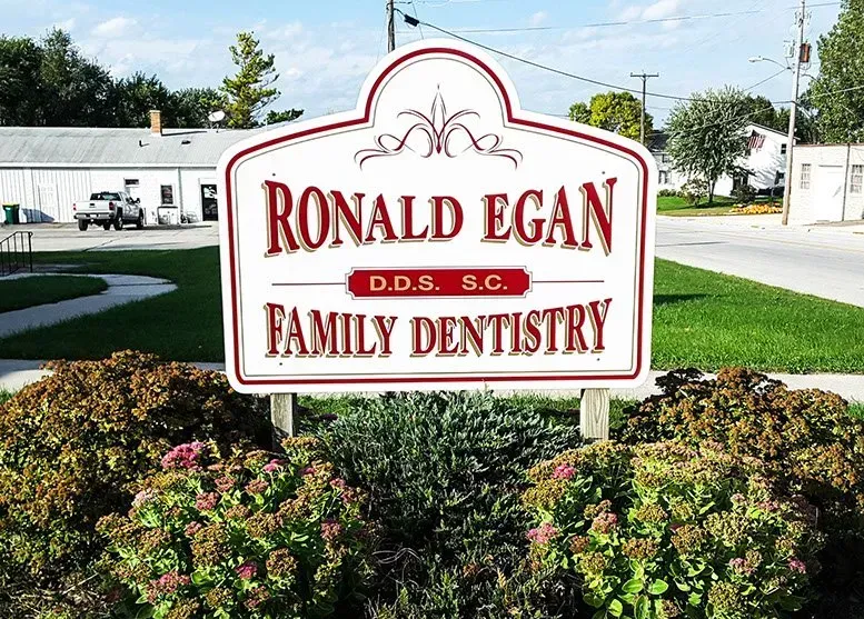 A sign that says ronald egan family dentistry on it