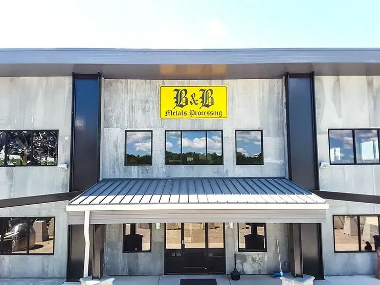 A building with a sign that says b & b on it