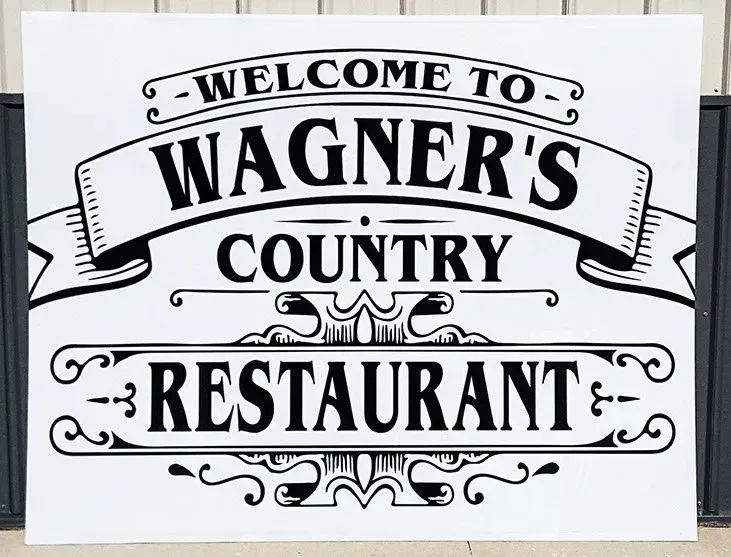 A black and white sign that says welcome to wagner 's country restaurant