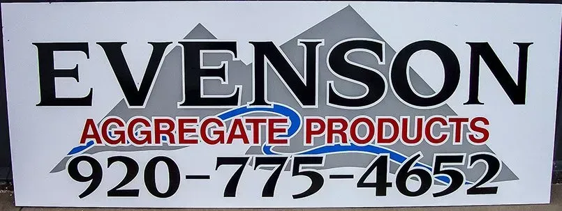 A sign for evenson aggregate products with a phone number