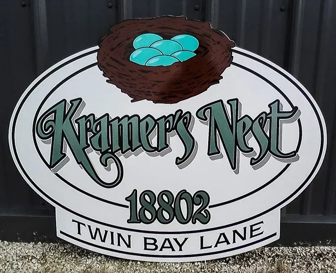 A sign for kramer 's nest twin bay lane
