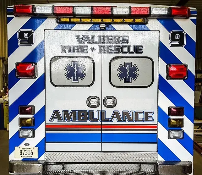 The back of an ambulance with the number 9 on it