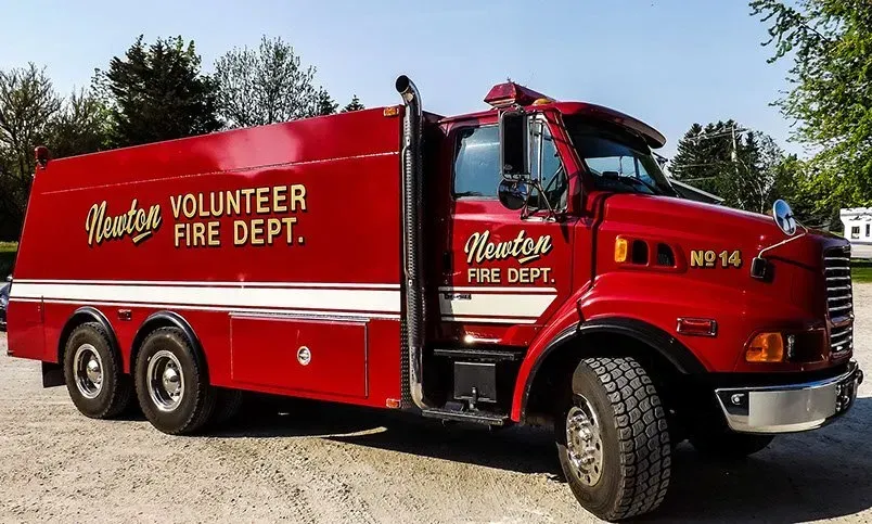 A red fire truck from the newton volunteer fire department