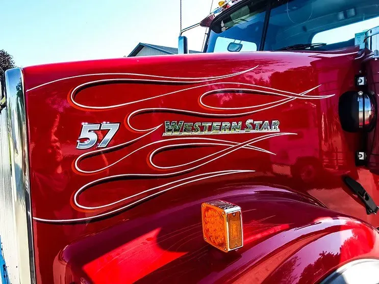 A red truck with the number 57 on it