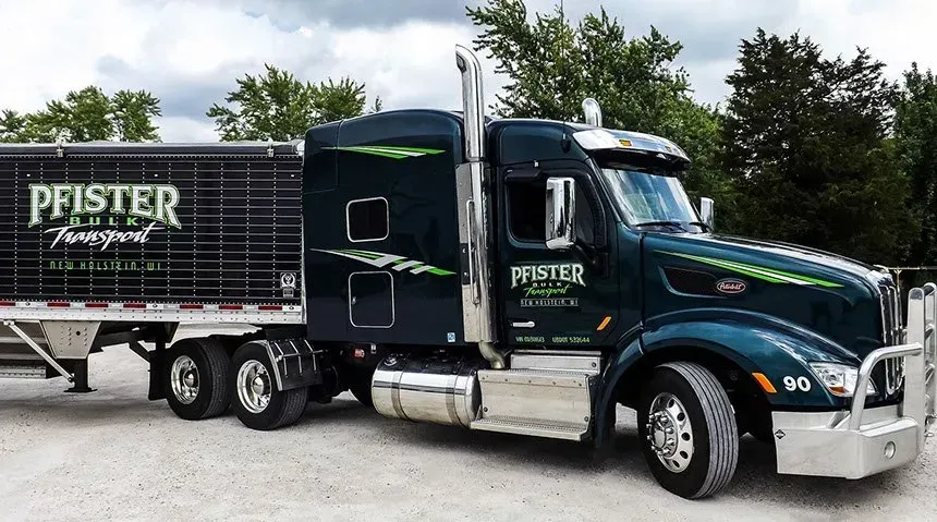 A pfister truck is parked in a parking lot