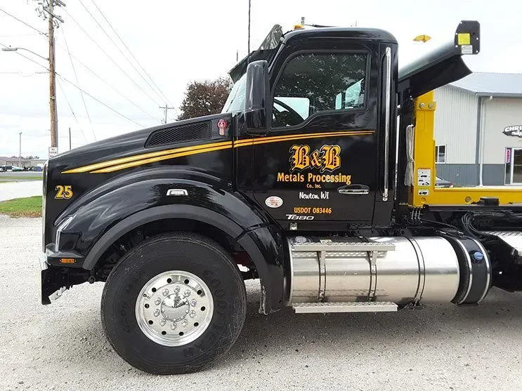 A black truck with the number 25 on it