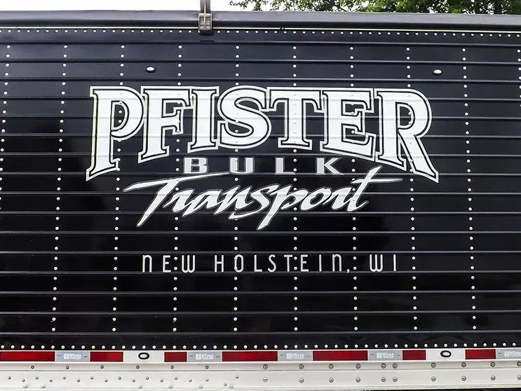 The back of a pfister bulk transport trailer
