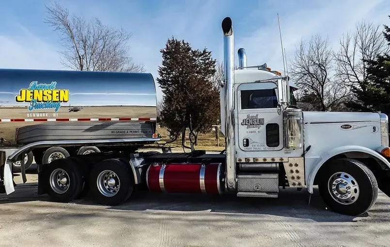 A semi truck with the word jensen on the side