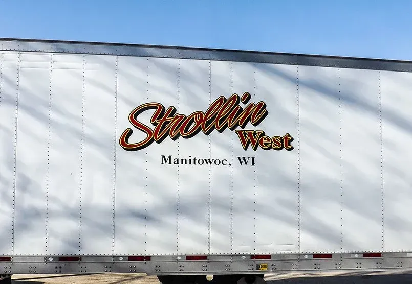 A white trailer with the word stoollie west on it
