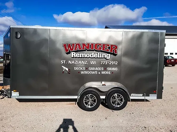 A trailer that says waniger remodeling on it