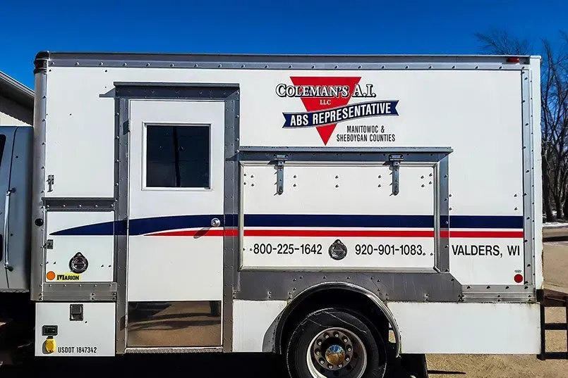 A white ambulance with the word representative on the side