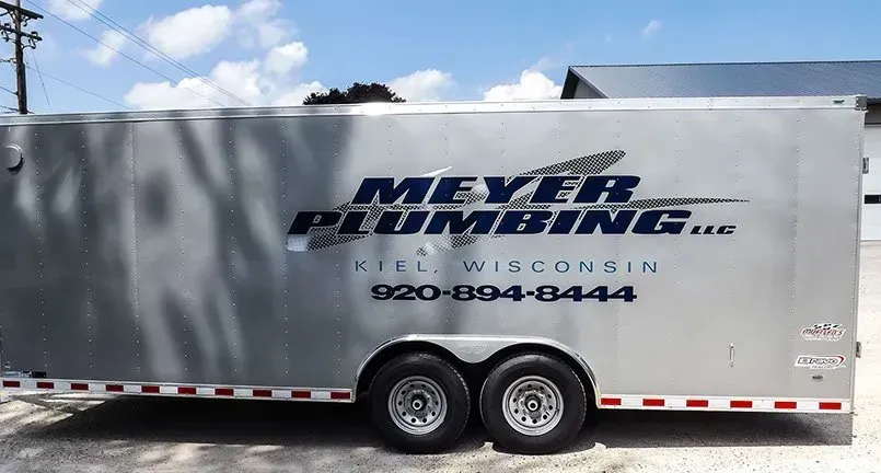 A trailer with meyer plumbing written on it