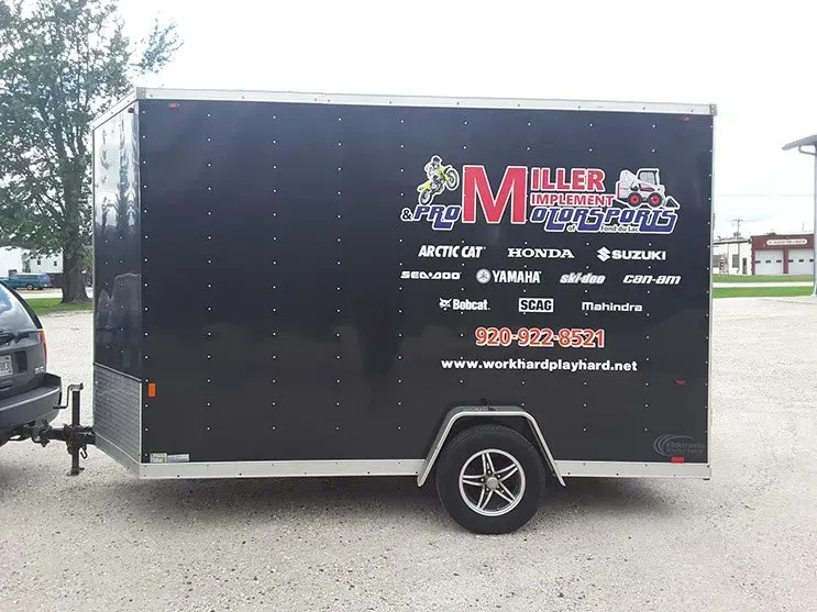 A black trailer with the word miller on it