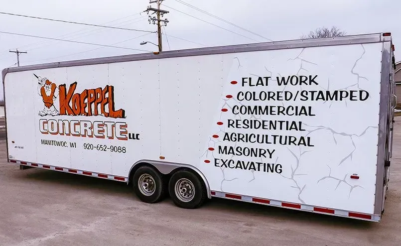 A white trailer with the word concrete on it