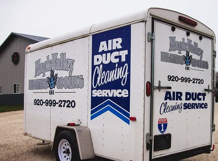 A trailer that says air duct cleaning service on it